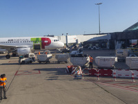 Airport workers are on land at Orly Airport in Paris, France, on September 15, 2024. Airports Council International (ACI) World releases its...