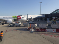 Airport workers are on land at Orly Airport in Paris, France, on September 15, 2024. Airports Council International (ACI) World releases its...