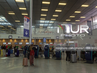 A person rolls a suitcase at Orly Airport in Paris, France, on September 18, 2024. Airports Council International (ACI) World releases its l...