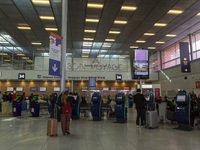 A person rolls a suitcase at Orly Airport in Paris, France, on September 18, 2024. Airports Council International (ACI) World releases its l...