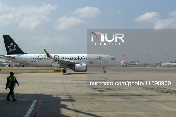 An airplane is seen at Lisbon airport in Lisbon, Portugal, on September 18, 2024. Airports Council International (ACI) World releases its la...