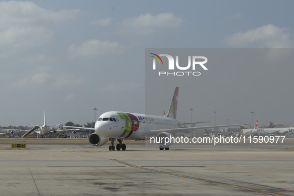 An airplane is seen at Lisbon airport in Lisbon, Portugal, on September 18, 2024. Airports Council International (ACI) World releases its la...