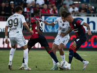 Saba Goglichidze (Empoli FC) and Alessandro Deiola (#14 Cagliari Calcio) during the Serie A TIM match between Cagliari Calcio and Empoli FC...