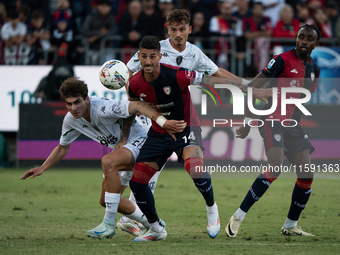 Saba Goglichidze (Empoli FC) and Alessandro Deiola (#14 Cagliari Calcio) during the Serie A TIM match between Cagliari Calcio and Empoli FC...