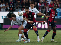 Saba Goglichidze (Empoli FC) and Alessandro Deiola (#14 Cagliari Calcio) during the Serie A TIM match between Cagliari Calcio and Empoli FC...