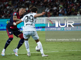 Alessandro Deiola (#14 Cagliari Calcio) and Sebastiano Esposito (Empoli FC) during the Serie A TIM match between Cagliari Calcio and Empoli...