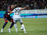 Alessandro Deiola (#14 Cagliari Calcio) and Sebastiano Esposito (Empoli FC) during the Serie A TIM match between Cagliari Calcio and Empoli...