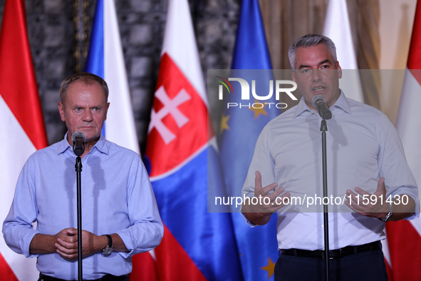 Polish Prime Minister Donald Tusk (L) with Austrian Chancellor Karl Nehammer (R) during a meeting with EC President Ursula von der Leyen, Cz...