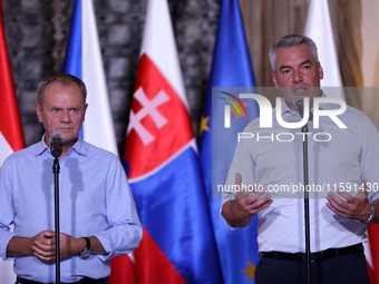 Polish Prime Minister Donald Tusk (L) with Austrian Chancellor Karl Nehammer (R) during a meeting with EC President Ursula von der Leyen, Cz...