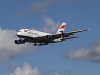 British Airways Airbus A380 Superjumbo passenger aircraft, spotted flying on final approach for landing on London Heathrow Airport runway in...