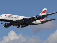 British Airways Airbus A380 Superjumbo passenger aircraft, spotted flying on final approach for landing on London Heathrow Airport runway in...