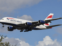 British Airways Airbus A380 Superjumbo passenger aircraft, spotted flying on final approach for landing on London Heathrow Airport runway in...