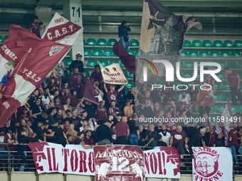 Supporters of Torino FC during the Serie A Enilive match between Hellas Verona and Torino FC at Stadio Marcantonio Bentegodi on September 20...