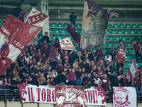 Supporters of Torino FC during the Serie A Enilive match between Hellas Verona and Torino FC at Stadio Marcantonio Bentegodi on September 20...