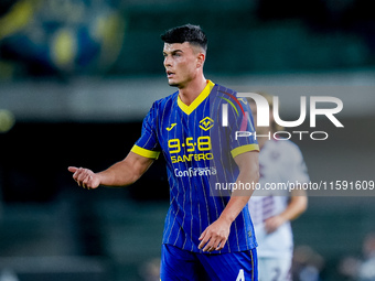 Flavius Daniliuc of Hellas Verona gestures during the Serie A Enilive match between Hellas Verona and Torino FC at Stadio Marcantonio Benteg...