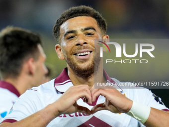 Che' Adams of Torino FC celebrates after scoring third goal during the Serie A Enilive match between Hellas Verona and Torino FC at Stadio M...