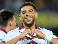 Che' Adams of Torino FC celebrates after scoring third goal during the Serie A Enilive match between Hellas Verona and Torino FC at Stadio M...