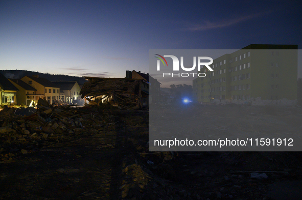 Heavily damaged buildings are seen at sunset after a flood hit the town of Stronie Slaskie, Poland on September 20, 2024. 