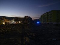 Heavily damaged buildings are seen at sunset after a flood hit the town of Stronie Slaskie, Poland on September 20, 2024. (