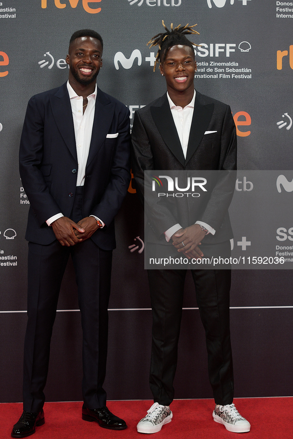 Nico Williams and Inaki Williams attend the red carpet opening of the 72nd San Sebastian International Film Festival in San Sebastian, Spain...