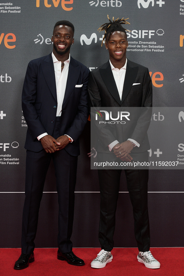 Nico Williams and Inaki Williams attend the red carpet opening of the 72nd San Sebastian International Film Festival in San Sebastian, Spain...