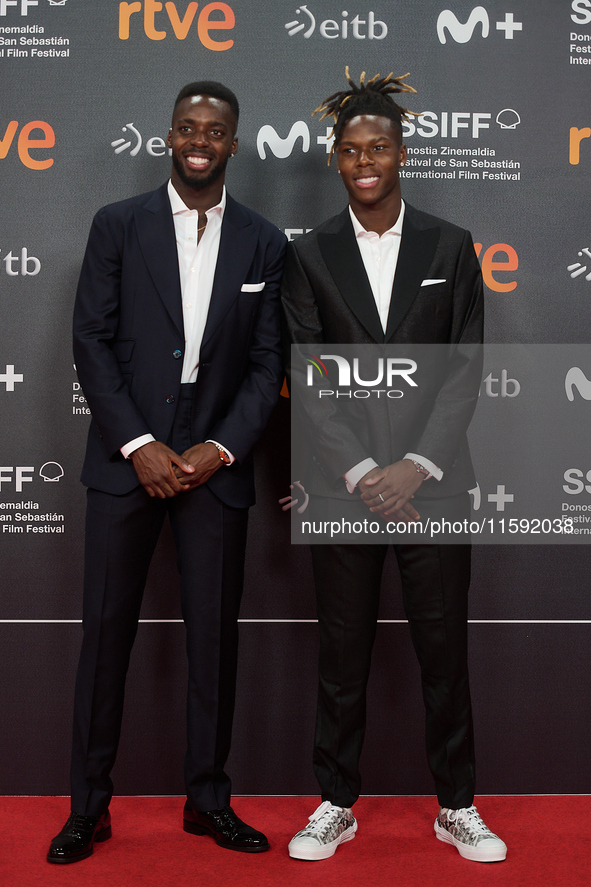 Nico Williams and Inaki Williams attend the red carpet opening of the 72nd San Sebastian International Film Festival in San Sebastian, Spain...