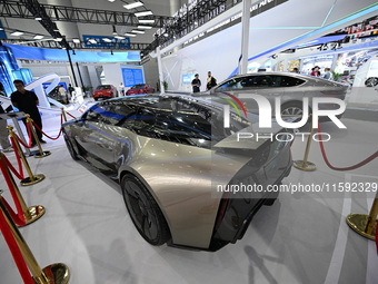 Visitors view JAC Group's concept car DEFINE at the 2024 World Manufacturing Conference in Hefei, China, on September 20, 2024. This four-do...