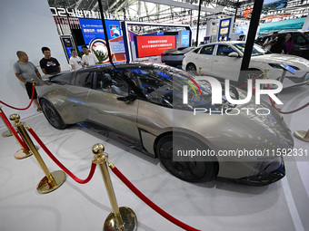 Visitors view JAC Group's concept car DEFINE at the 2024 World Manufacturing Conference in Hefei, China, on September 20, 2024. This four-do...