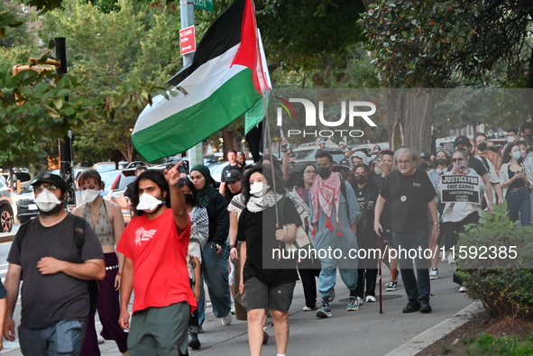 Protesters march and demonstrate for Black and Palestinian liberation following the subway shooting in Brooklyn, strikes from Israel on Hezb...