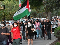 Protesters march and demonstrate for Black and Palestinian liberation following the subway shooting in Brooklyn, strikes from Israel on Hezb...