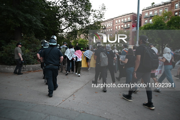 Protesters demonstrate for Black and Palestinian liberation following the subway shooting in Brooklyn, strikes from Israel on Hezbollah in L...