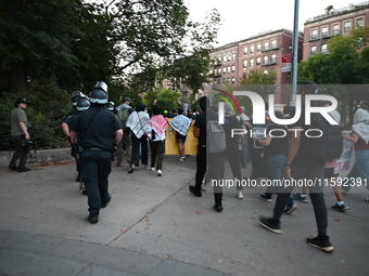 Protesters demonstrate for Black and Palestinian liberation following the subway shooting in Brooklyn, strikes from Israel on Hezbollah in L...