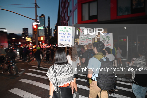 Protesters demonstrate for Black and Palestinian liberation following the subway shooting in Brooklyn, strikes from Israel on Hezbollah in L...