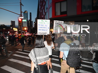 Protesters demonstrate for Black and Palestinian liberation following the subway shooting in Brooklyn, strikes from Israel on Hezbollah in L...