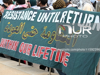 A sign says ''resistance.'' Protesters demonstrate and make their voices heard for Black and Palestinian liberation following the subway sho...