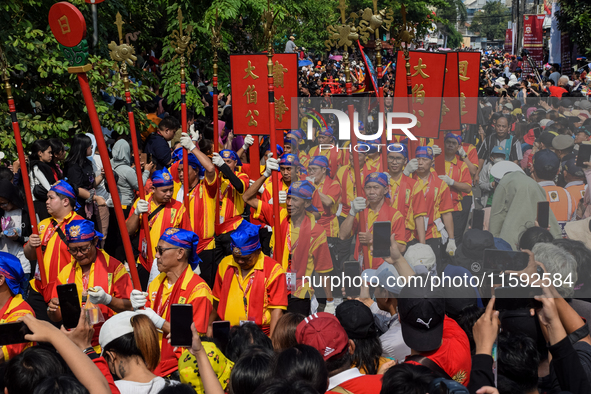 The atmosphere of the 'Gotong Toapekong' (Carrying Toapekong) tradition in Tangerang, Banten Province, Indonesia, on September 21, 2024. Thi...