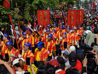 The atmosphere of the 'Gotong Toapekong' (Carrying Toapekong) tradition in Tangerang, Banten Province, Indonesia, on September 21, 2024. Thi...