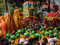 The atmosphere of the 'Gotong Toapekong' (Carrying Toapekong) tradition in Tangerang, Banten Province, Indonesia, on September 21, 2024. Thi...