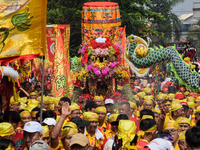 The atmosphere of the 'Gotong Toapekong' (Carrying Toapekong) tradition in Tangerang, Banten Province, Indonesia, on September 21, 2024. Thi...