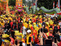 The atmosphere of the 'Gotong Toapekong' (Carrying Toapekong) tradition in Tangerang, Banten Province, Indonesia, on September 21, 2024. Thi...