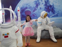 A child plays a game in the space experience area during the 2024 National Science Popularization Day in Beijing, China, on September 21, 20...