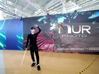 Actors demonstrate scenes for the production of ''Black Myth: Wukong'' through motion capture technology during the event of the 2024 Nation...