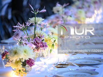 Dinner table at the Versace fashion show during the Milan Womenswear Spring/Summer 2025 in Milan, Italy, on September 20, 2024 (