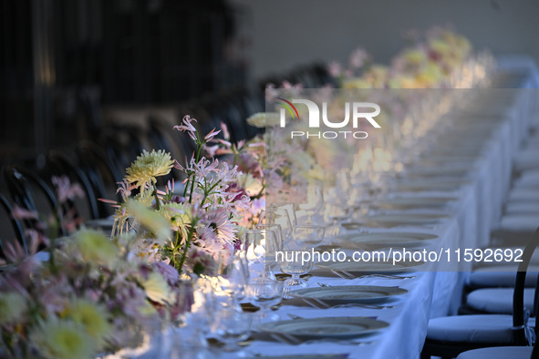 Dinner table at the Versace fashion show during the Milan Womenswear Spring/Summer 2025 in Milan, Italy, on September 20, 2024 