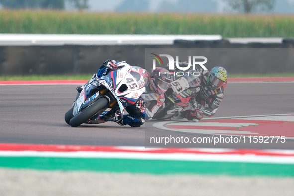 Scott Redding from the United Kingdom of Bonovo Action BMW Team rides a BMW M1000 RR, and Tito Rabat from Spain of Kawasaki Puccetti Racing...