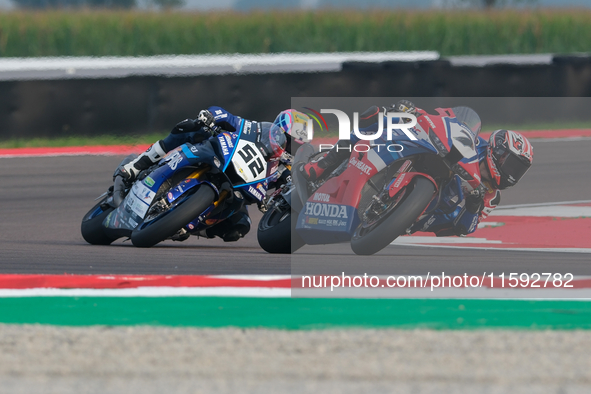 Iker Lecuona from Spain of Team HRC rides a Honda CBR1000-RR, and Alessandro Delbianco from Italy of Yamaha Motoxracing World SBK Team rides...