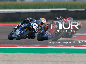 Iker Lecuona from Spain of Team HRC rides a Honda CBR1000-RR, and Alessandro Delbianco from Italy of Yamaha Motoxracing World SBK Team rides...