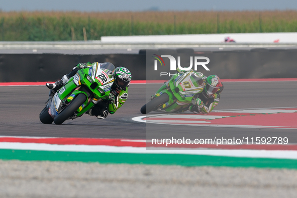 Alex Lowes from the United Kingdom of Kawasaki Racing Team World SBK rides a Kawasaki ZX-10RR, followed by Axel Bassani from Italy of Kawasa...