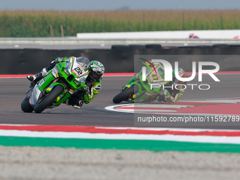 Alex Lowes from the United Kingdom of Kawasaki Racing Team World SBK rides a Kawasaki ZX-10RR, followed by Axel Bassani from Italy of Kawasa...