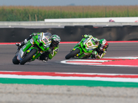 Alex Lowes from the United Kingdom of Kawasaki Racing Team World SBK rides a Kawasaki ZX-10RR, followed by Axel Bassani from Italy of Kawasa...